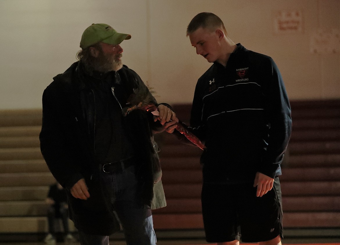 Matt Thurlow celebrates Senior Night with his dad.