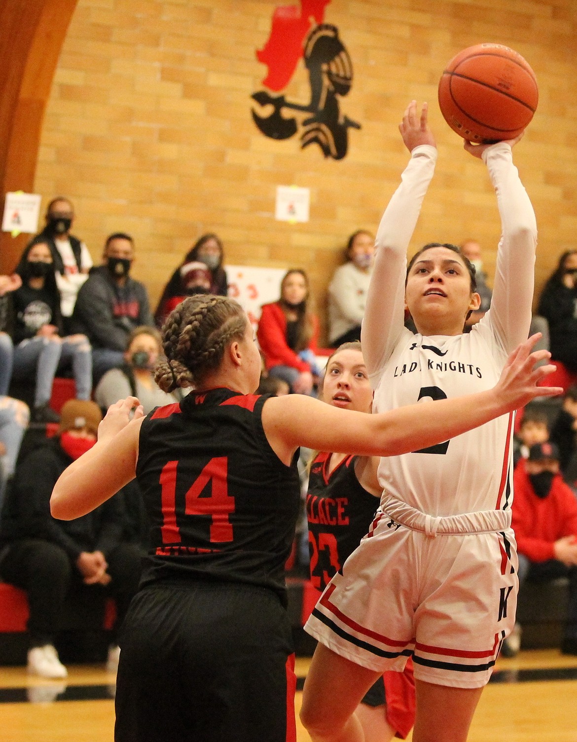 JASON ELLIOTT/Press
Lakeside junior guard Jolissa Holt shoots over Wallace senior Chloe Cielke during the first half of Friday's 1A Division I District 1 girls basketball championship game at Ron Miller Court on Friday.