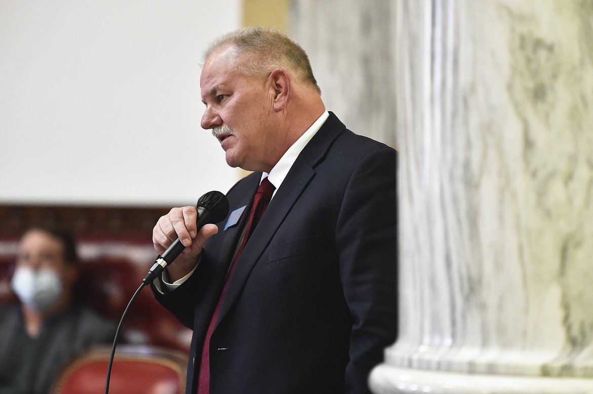 FILE - In this Dec. 7, 2020, file photo, state Rep. Barry Usher, R-Billings, speaks during a meeting of the Joint Rules Committee on the House floor at the Montana State Capitol in Helena, Mont. Montana media organizations have filed a lawsuit against Usher arguing he violated state open meetings laws by holding a secret meeting of a majority of the Republicans on the House Judiciary Committee before the committee voted on bills involving transgender healthcare and abortion. (Thom Bridge/Independent Record via AP, File)