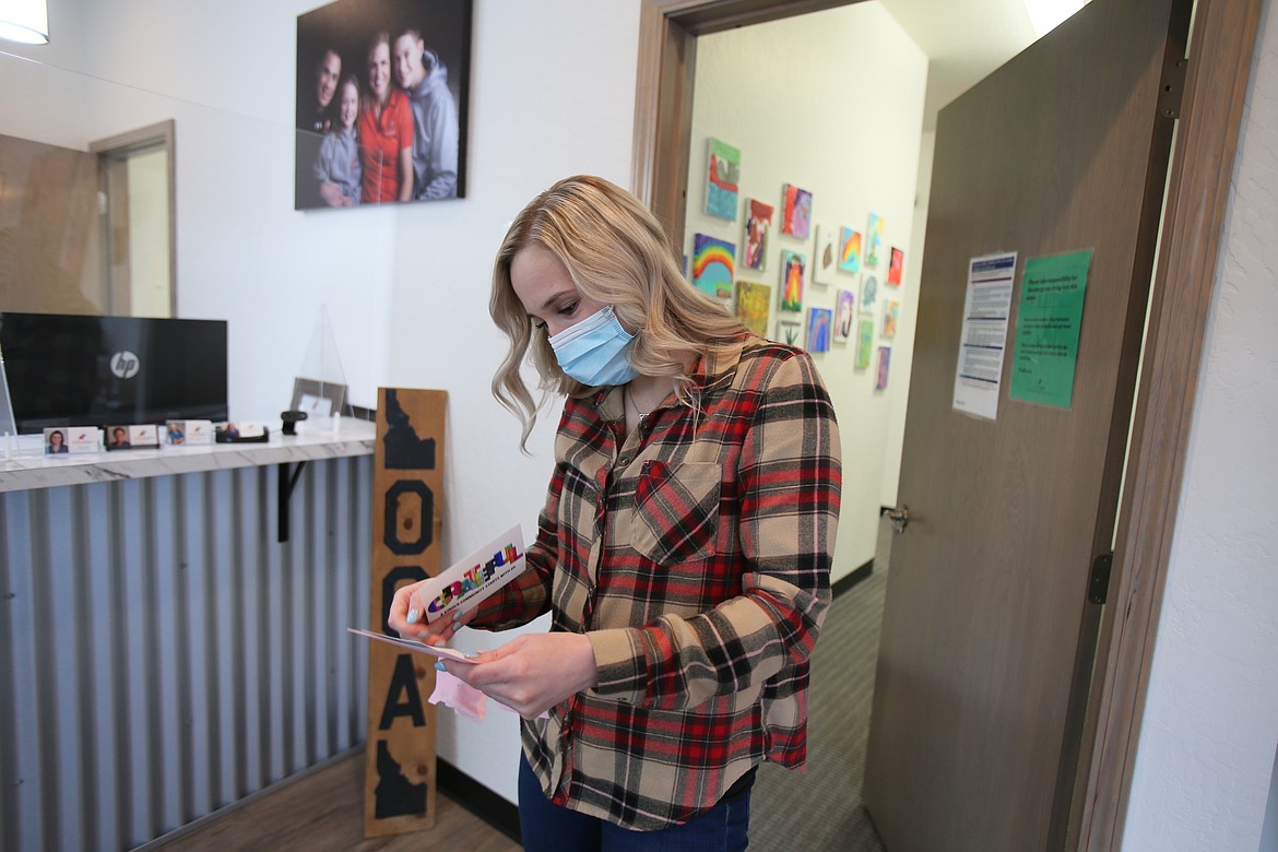 Courtney Bissel, front desk employee at Active Family Healthcare, is feeling the love Friday as her office is one of several Kindness Card recipients. The Kindness Card project was orchestrated by Love Lives Here CDA and the Civic Engagement Alliance. More cards will go out after Valentine's Day.