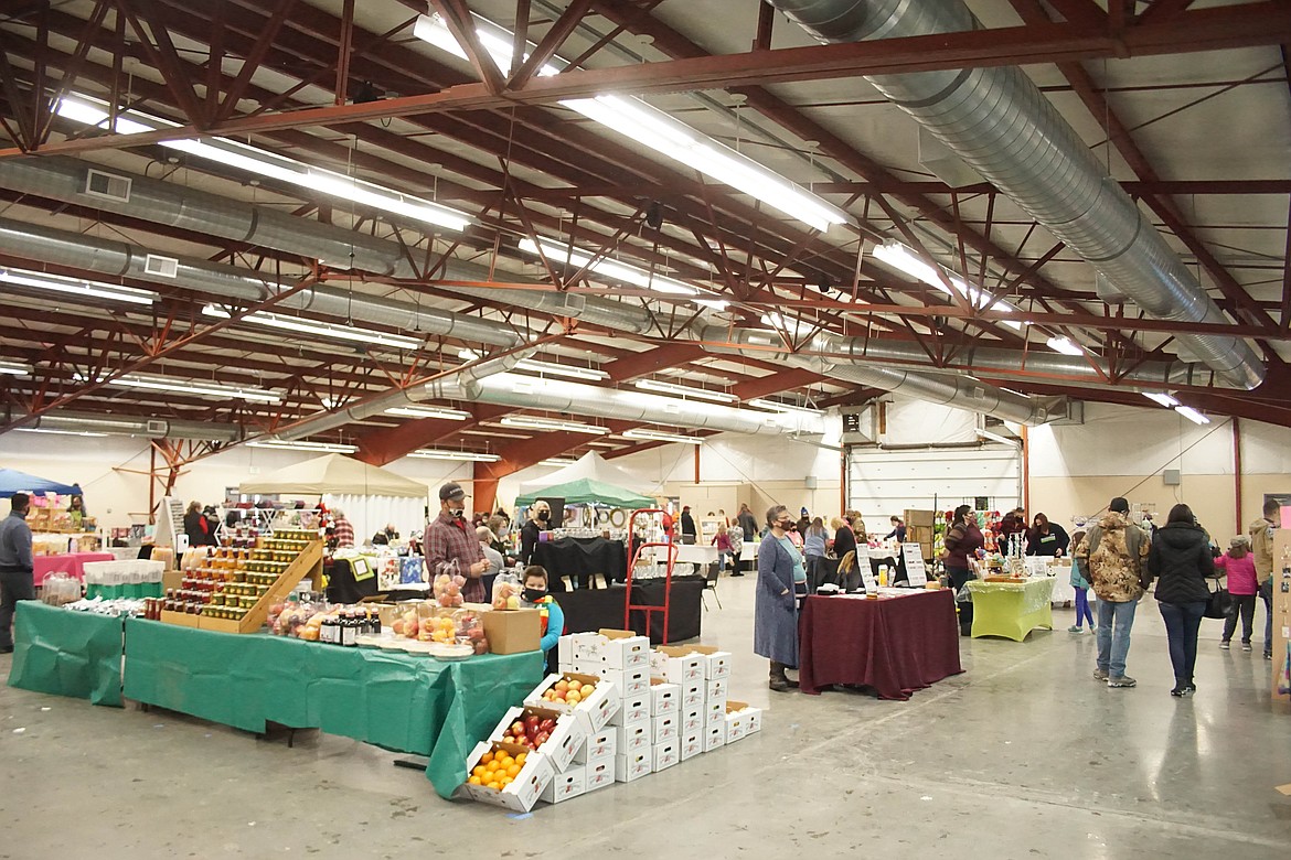 Around 40 booths filled the Grant County Fairgrounds commercial building for the spring farmers market Saturday.