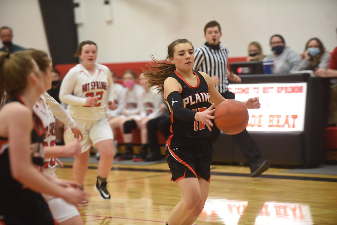 Plains basketball player Carlie Wagoner drives to the basket against Hot Springs last Friday. The Trotters won 38-22. (Scott Shindledecker/Valley Press)