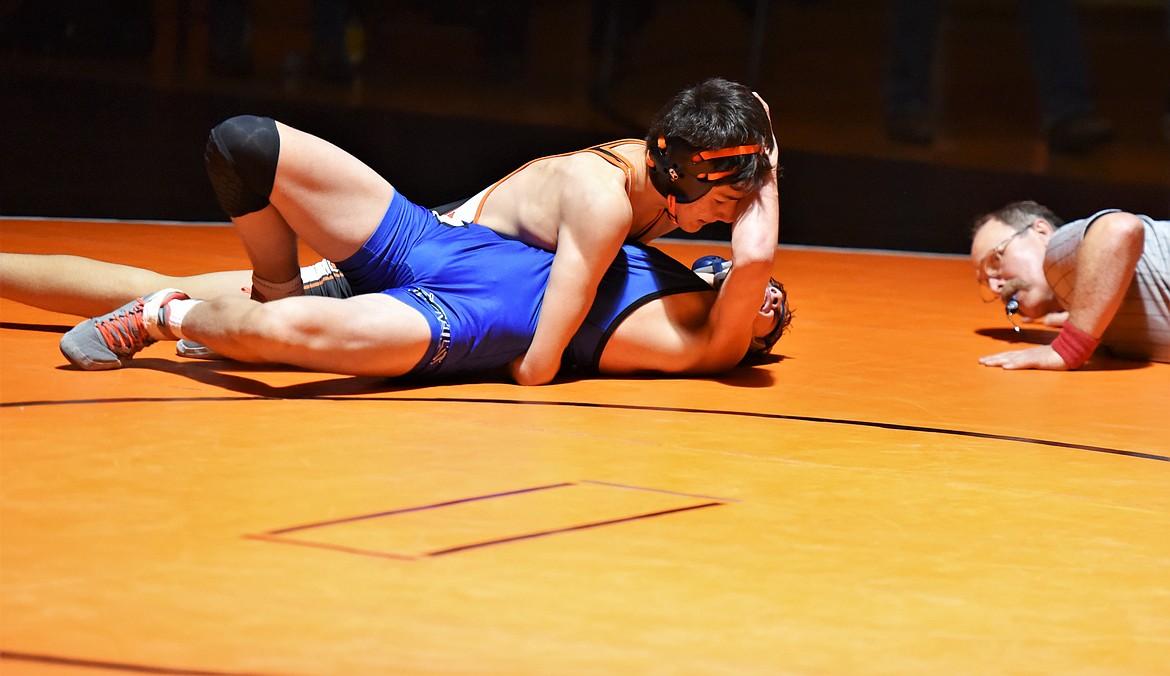 Beaudean Decker of Ronan, top, won by fall over Corvallis' Kanyon Stoker on Friday at Ronan. (Scot Heisel/Lake County Leader)