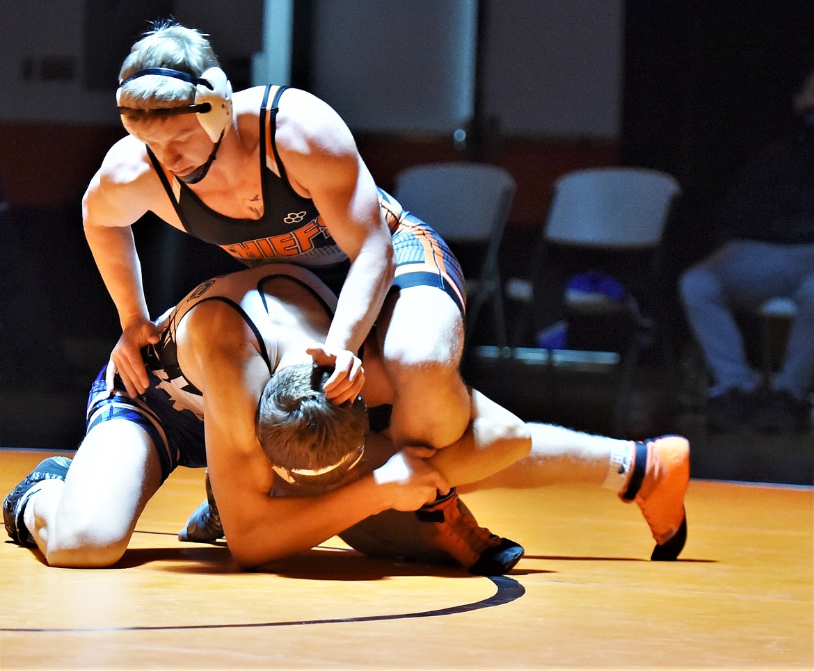 The Chiefs' Daniel Collins Bishop pinned Bryce Weidow of Corvallis in an extra match Friday. (Scot Heisel/Lake County Leader)