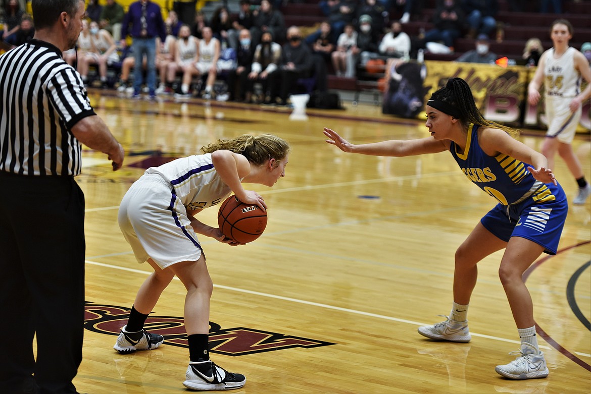 Libby's Olivia Gilliam-Smith guards Jazlyn Dalbey on Saturday. (Scot Heisel/Lake County Leader)