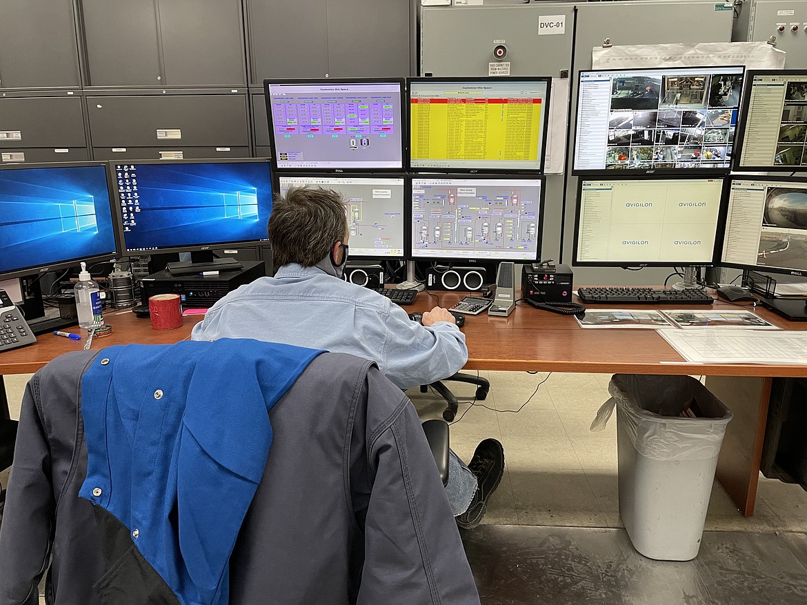 Engineer Mike Poff monitors the chemical production process at Moses Lake Industries in December 2020.