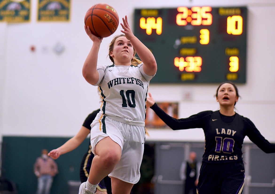 Lady Bulldog Ashton Ramsey capitalizes on a steal against Polson Thursday evening. (Whitney England/Whitefish Pilot)