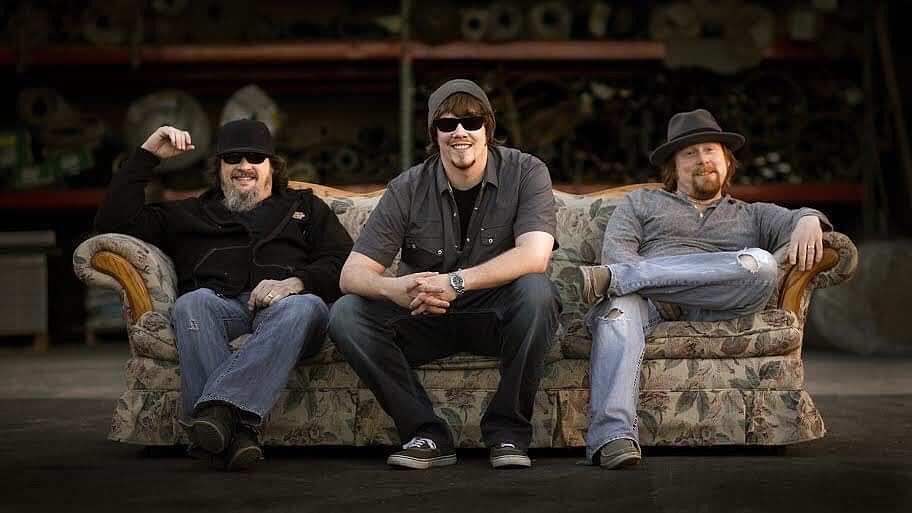 Left to right, Eric Groff, Ray Glover and John Wilson of Dimestore Prophets pose for a photo together in Moses Lake in 2018.