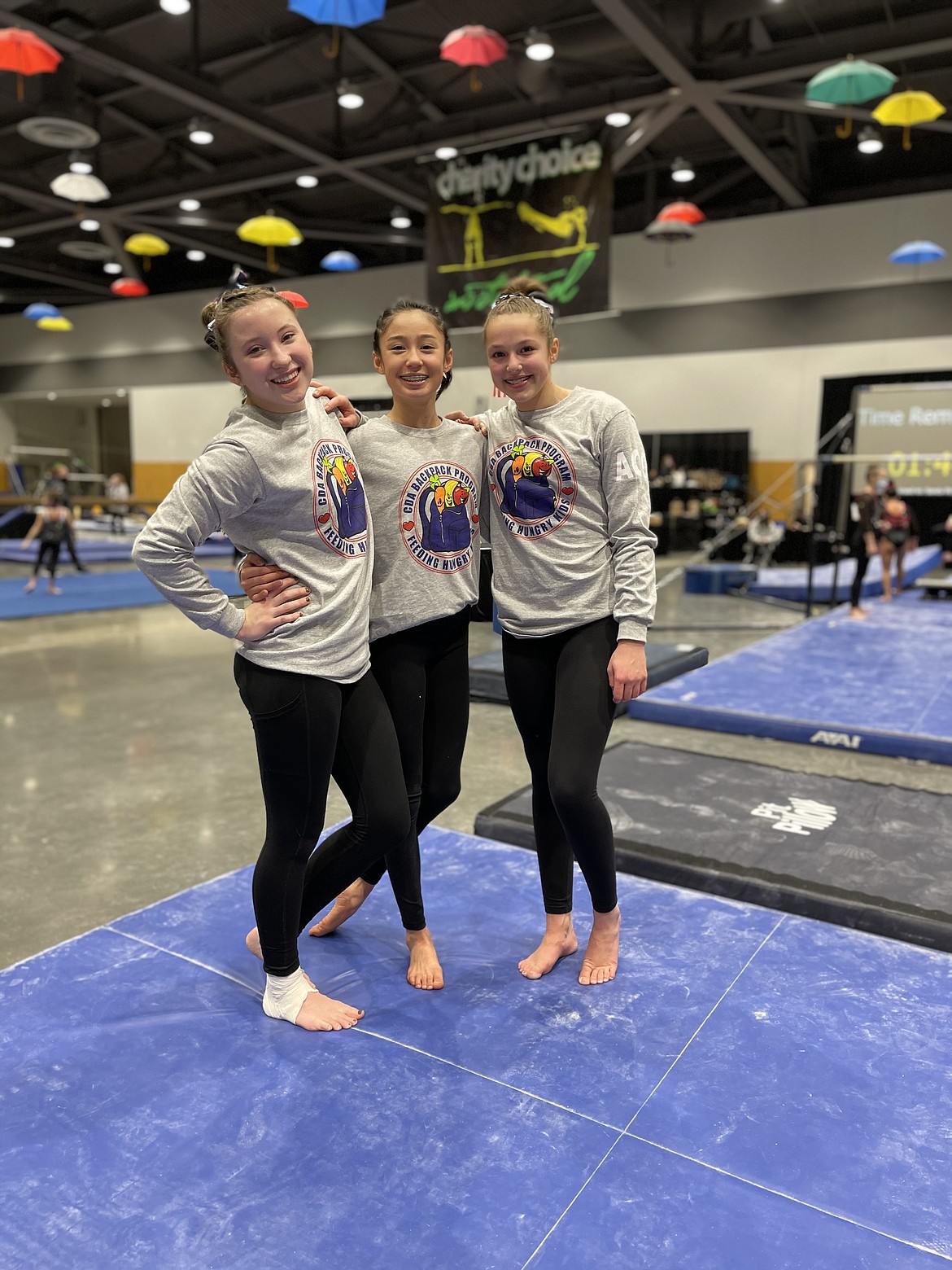 Courtesy photo
Avant Coeur Gymnastics Level 10s representing the CDA Backpack Program at the Charity Choice Invitational in Tacoma, Wash. From left are Sam Snow, Maiya Terry and Madalyn McCormick.