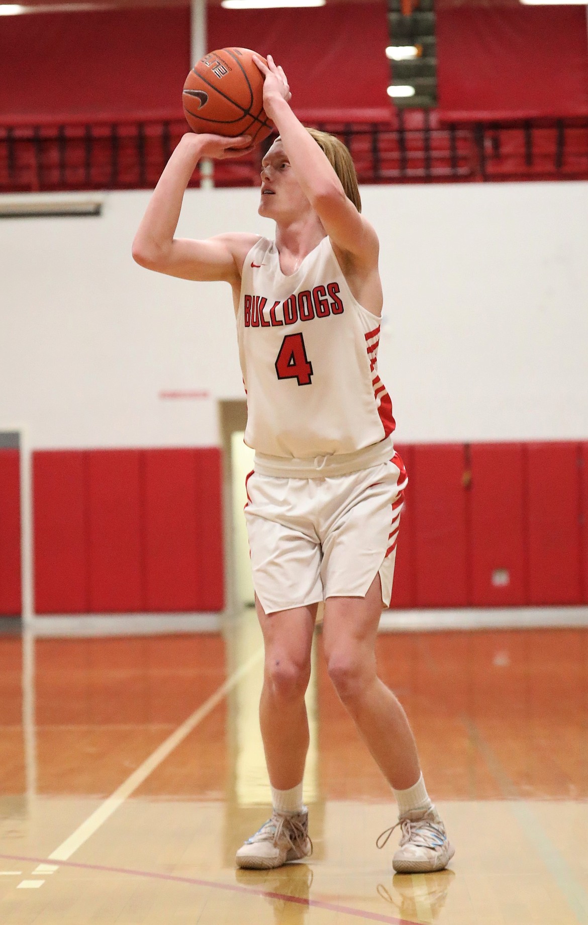 Sophomore Rusty Lee attempts a 3-pointer on Tuesday.