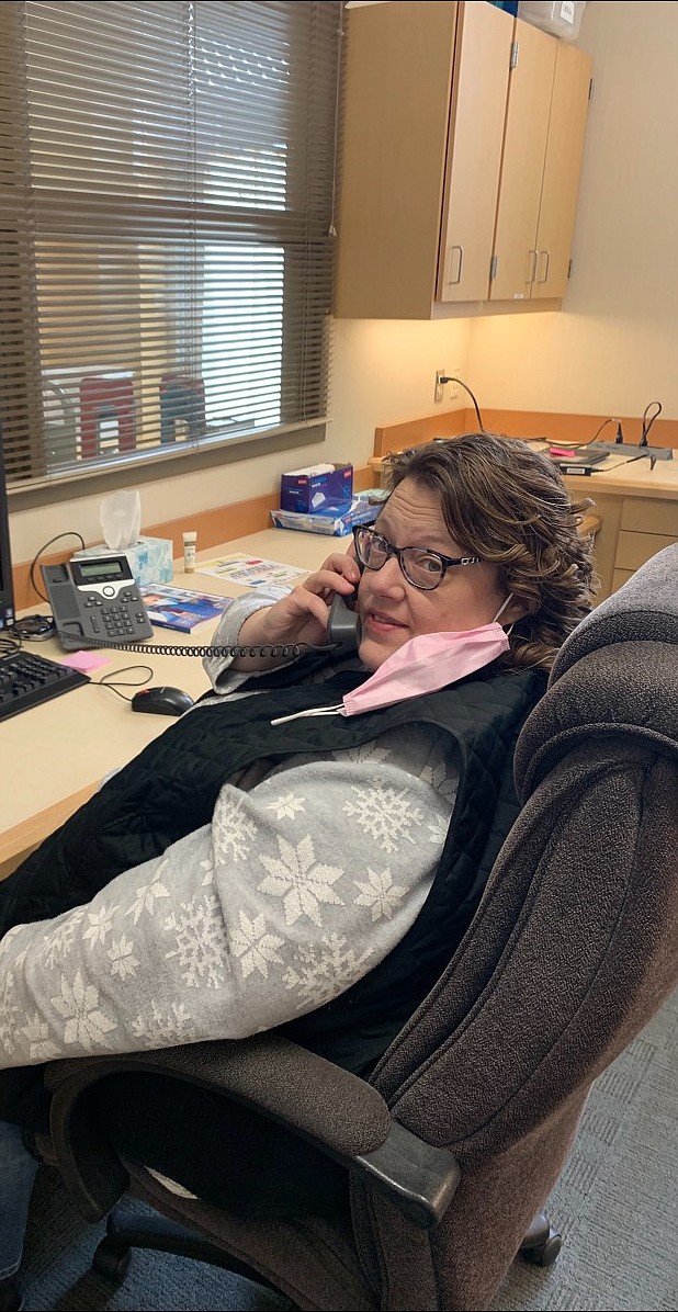 Moses Lake School District Nurse Cathie Hunt hard at work in her office at Park Orchard Elementary School.