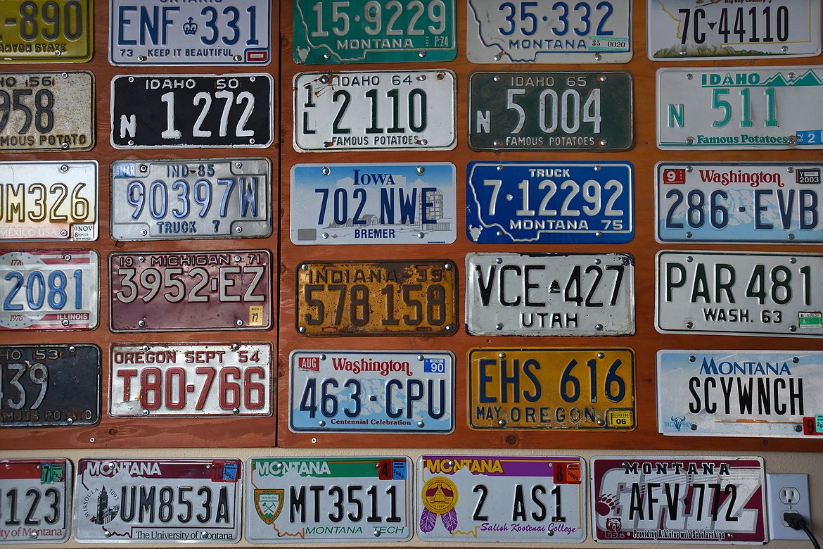 License plate collector Ken Fitzgerald his filled his garage in Kalispell with collection of more than 3,000 plates. (Jeremy Weber/Daily Inter Lake)