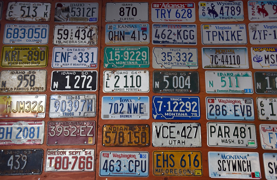 License plate collector Ken Fitzgerald his filled his garage in Kalispell with collection of more than 3,000 plates. (Jeremy Weber/Daily Inter Lake)