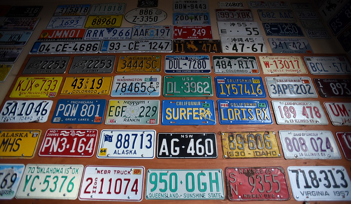 License plate collector Ken Fitzgerald his filled his garage in Kalispell with collection of more than 3,000 plates. (Jeremy Weber/Daily Inter Lake)