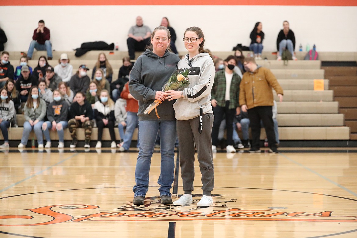 Annika Rantala poses for a photo with her mom on Senior Night.