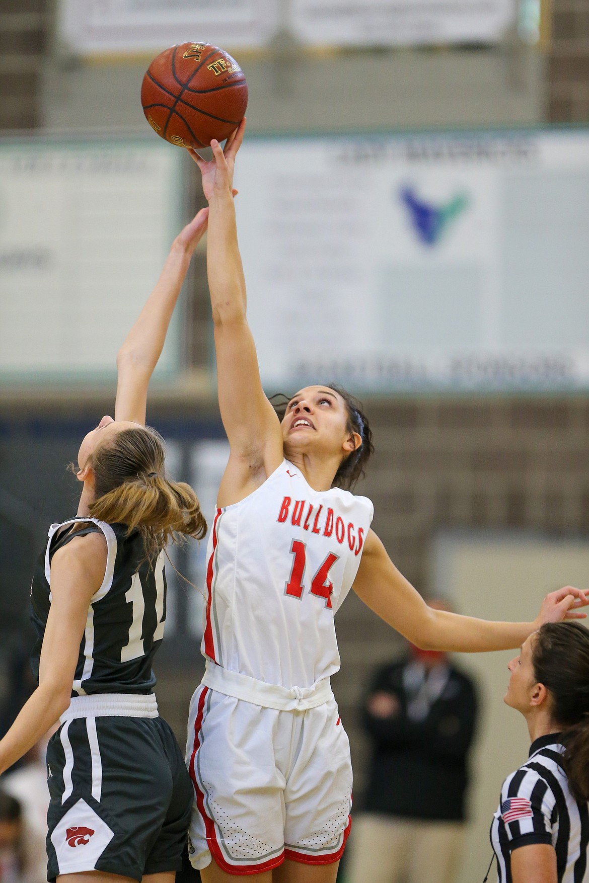 Senior Bella Phillips wins the opening tip of Sandpoint's 4A state opener against Columbia on Feb. 18.
