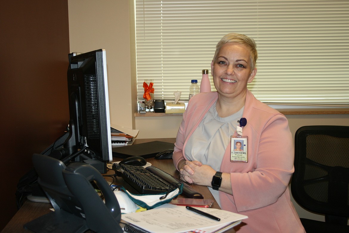 Andrea Carter, chief medical officer at Samaritan Hospital, in her office. Carter said that while men and women share some symptoms of heart disease, others are different for women.