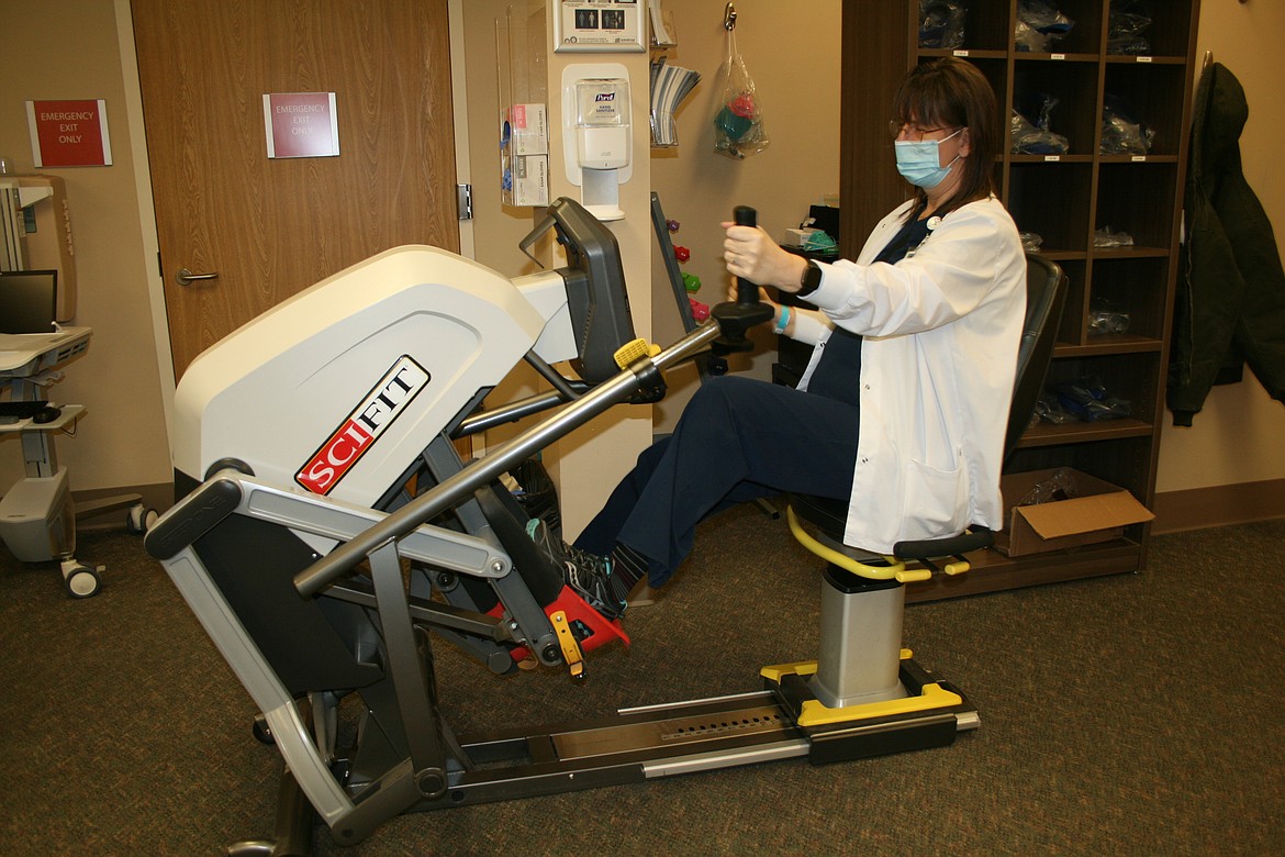 Katrina Hart works out on an exercise machine in the cardiac rehabilitation unit at Samaritan Hospital.