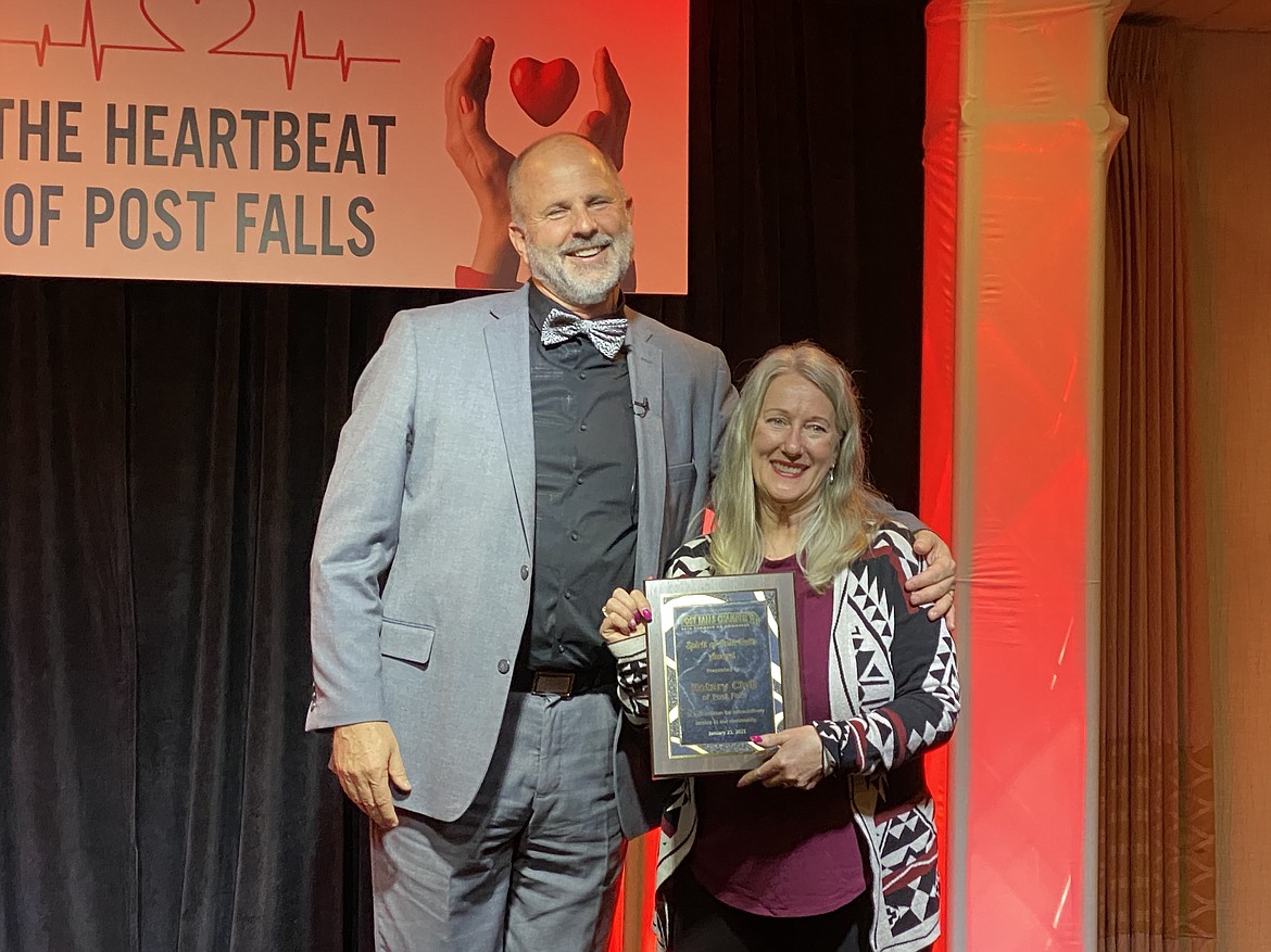 Citizen of the Year Graydon Stanley stands next to club president Kay Viebrock after honoring the Post Falls Rotary Club as the Post Falls Chamber of Commerce's 2020 Spirt of Post Falls Award winner. (MADISON HARDY/Press)