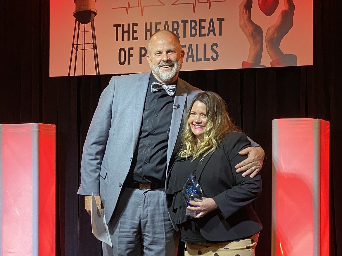 Citizen of the Year Graydon Stanley and the Post Falls Chamber of Commerce's 2020 Volunteer of the Year Award winner Christi Fleischman of Knock Marketing pose for the cameras at Thursday night's Annual Recognition Event. (MADISON HARDY/Press)