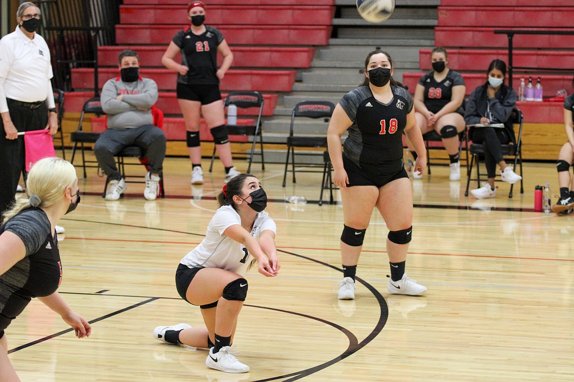 Othello libero Julissa Cantu hits the ground for the dig during the second set of the Huskies' 3-0 win over East Valley(Spokane) on Thursday night at Othello High School.