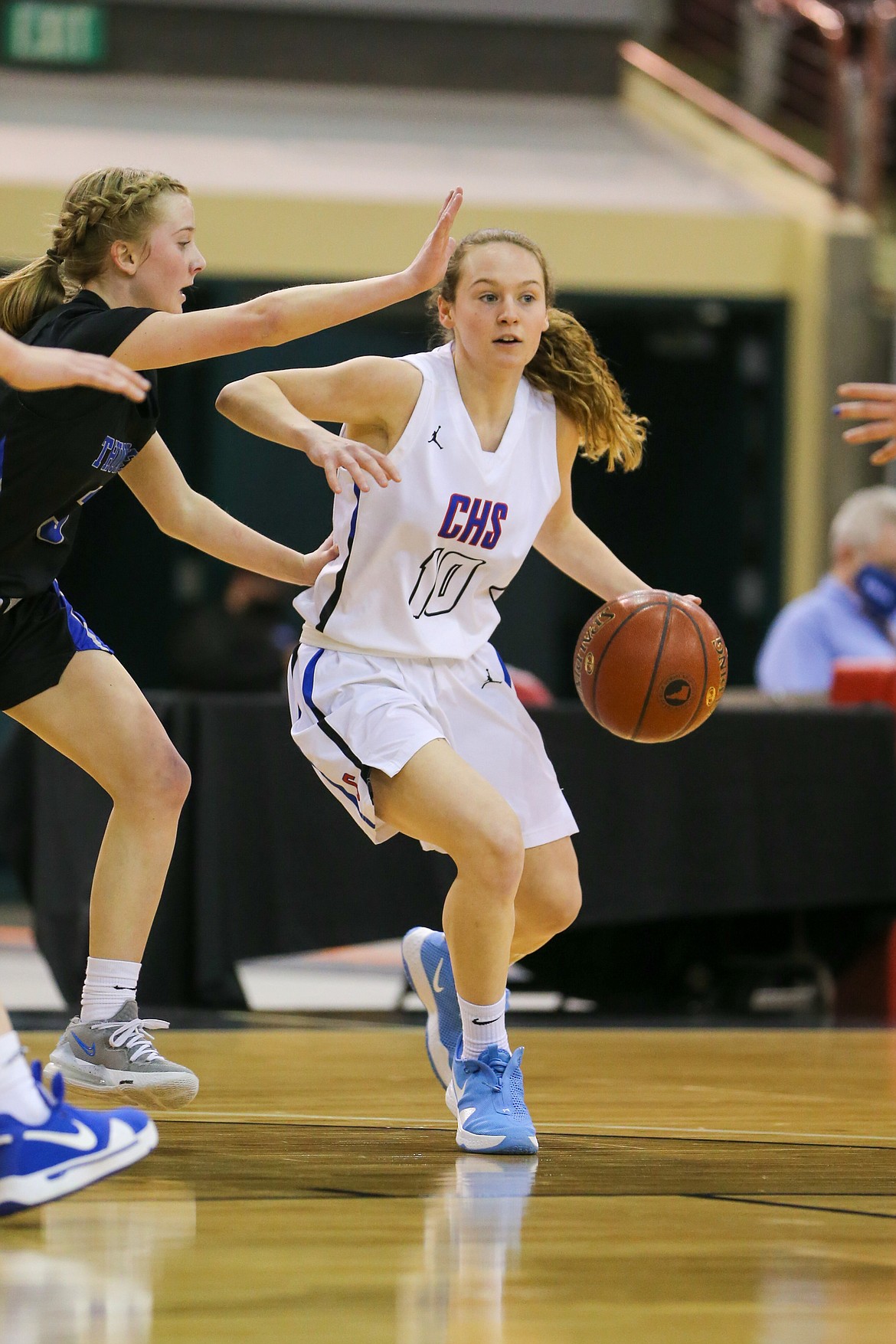 JASON DUCHOW PHOTOGRAPHY
Emma Whiteman (10) of Coeur d'Alene dribbles against Thunder Ridge on Friday in a state 5A girls basketball semifinal at the Ford Idaho Center in Nampa.