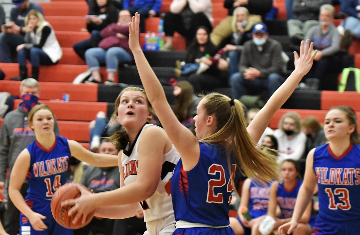 Jaylea Lunceford looks for a shot in the paint against Columbia Falls. (Scot Heisel/Lake County Leader)