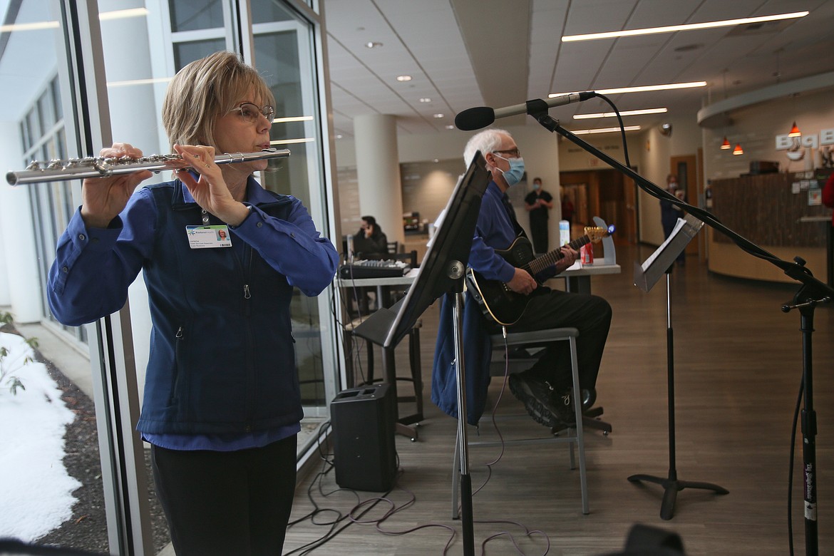 Lorena Brewer plays the flute and Lane Sumner plays guitar for Kootenai Health staff, patients and visitors on Friday. They have performed every Friday since the pandemic began and have participated in music videos featuring emergency department staff to pay tribute to health care workers everywhere.