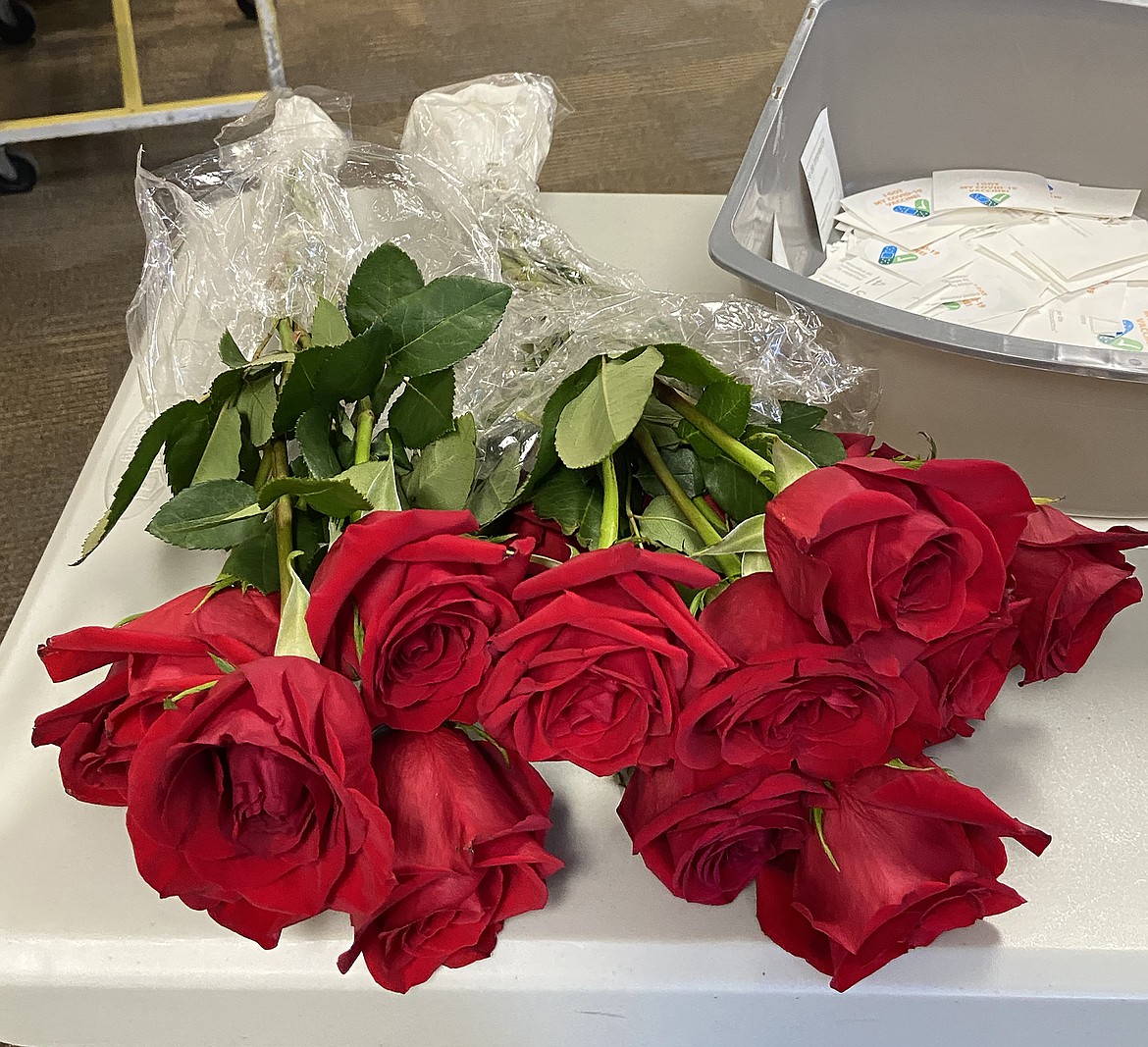 A woman was so thrilled to be receiving her COVID-19 vaccine Saturday, she brought along roses to give to those who made it possible.