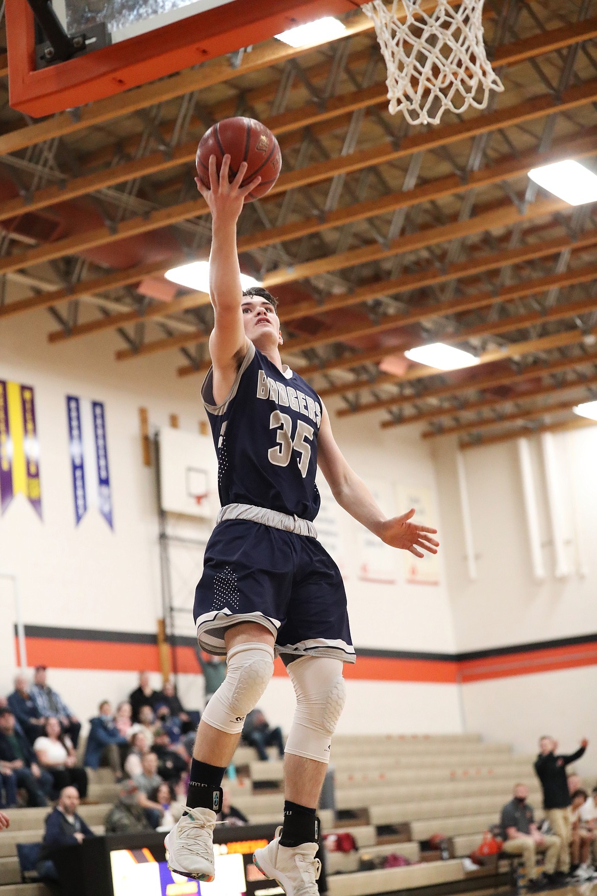 Sophomore Braeden Blackmore converts a layup for Bonners Ferry on Saturday.