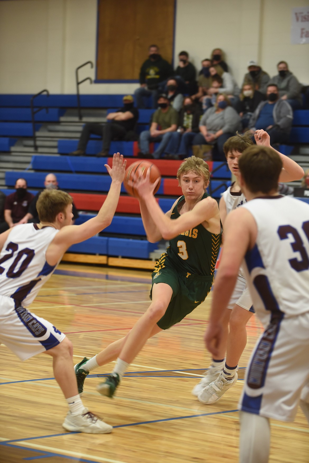 St. Regis senior forward Andrew Sanford helped the Tigers beat Clark Fork, 58-55, Saturday night for the District 14-C championship. Sanford scored 17 points and blocked several shots. (Scott Shindledecker/Valley Press)