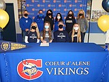 Signing photos Feb. 22, 2021
