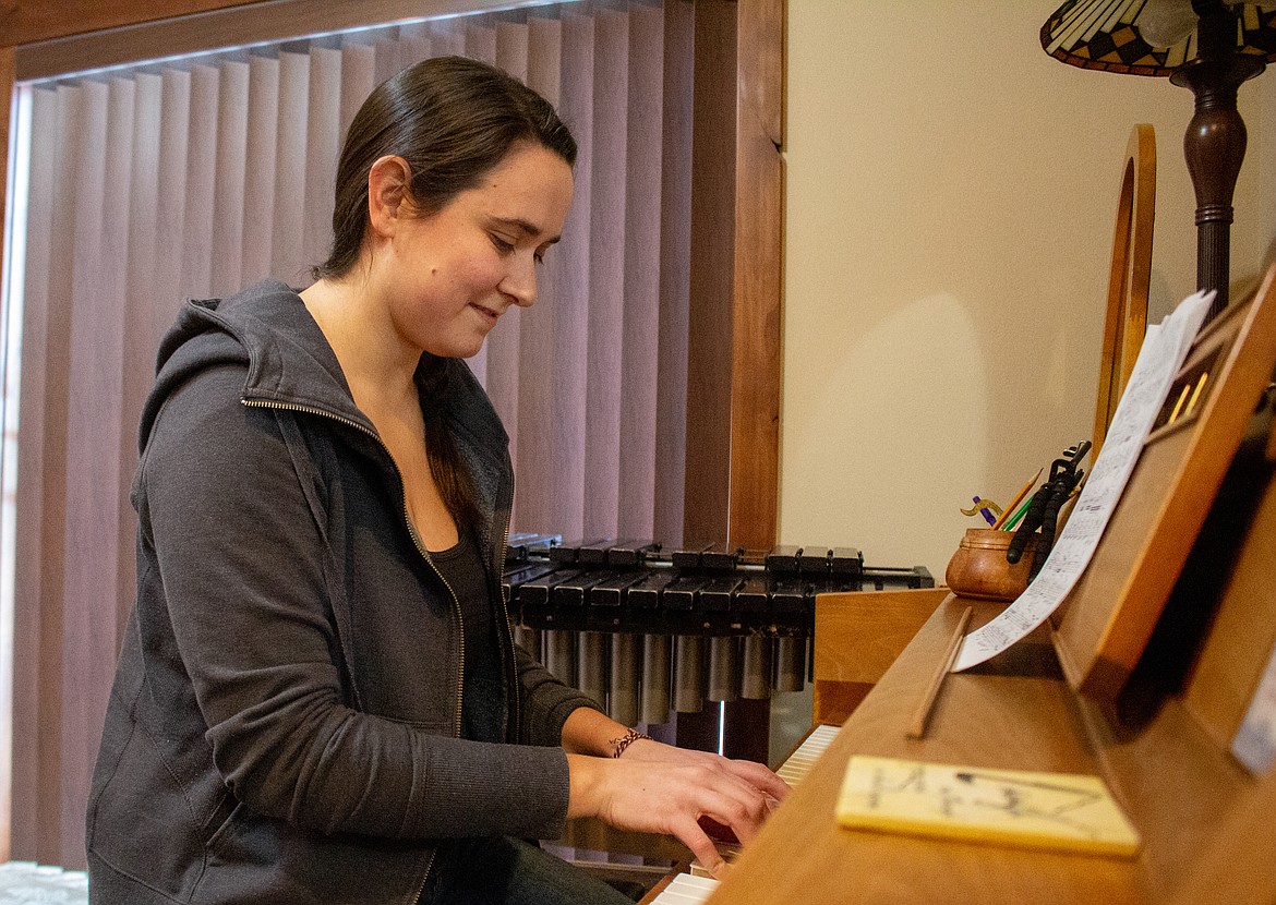 Alysen Hesselroth plays a tune at her piano in her parents' home in Othello on Sunday afternoon.