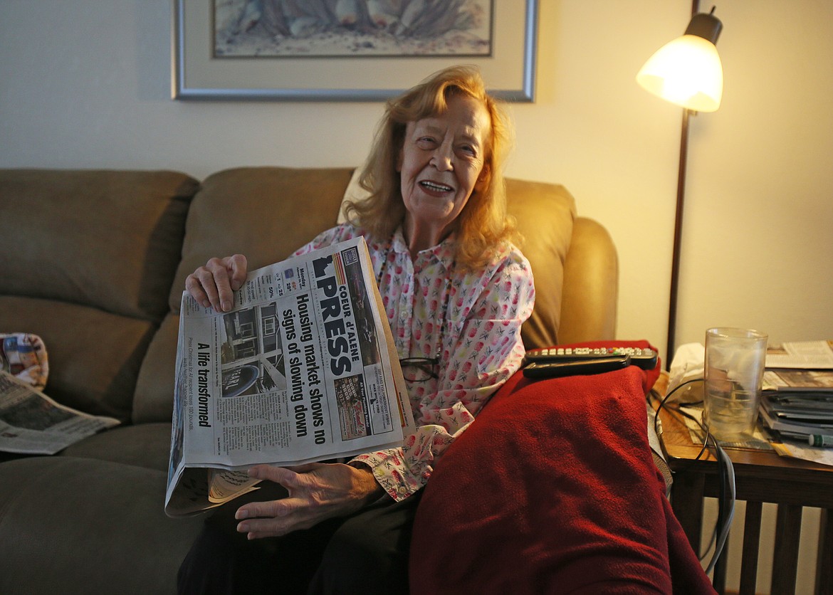 Dorothy Gohl, of Coeur d'Alene, giggles as she talks about how she and the love of her life, Chuck Dempsey, who died in October, used to love reading the Ghastly Groaner in The Press. She's seen here in her home Monday.