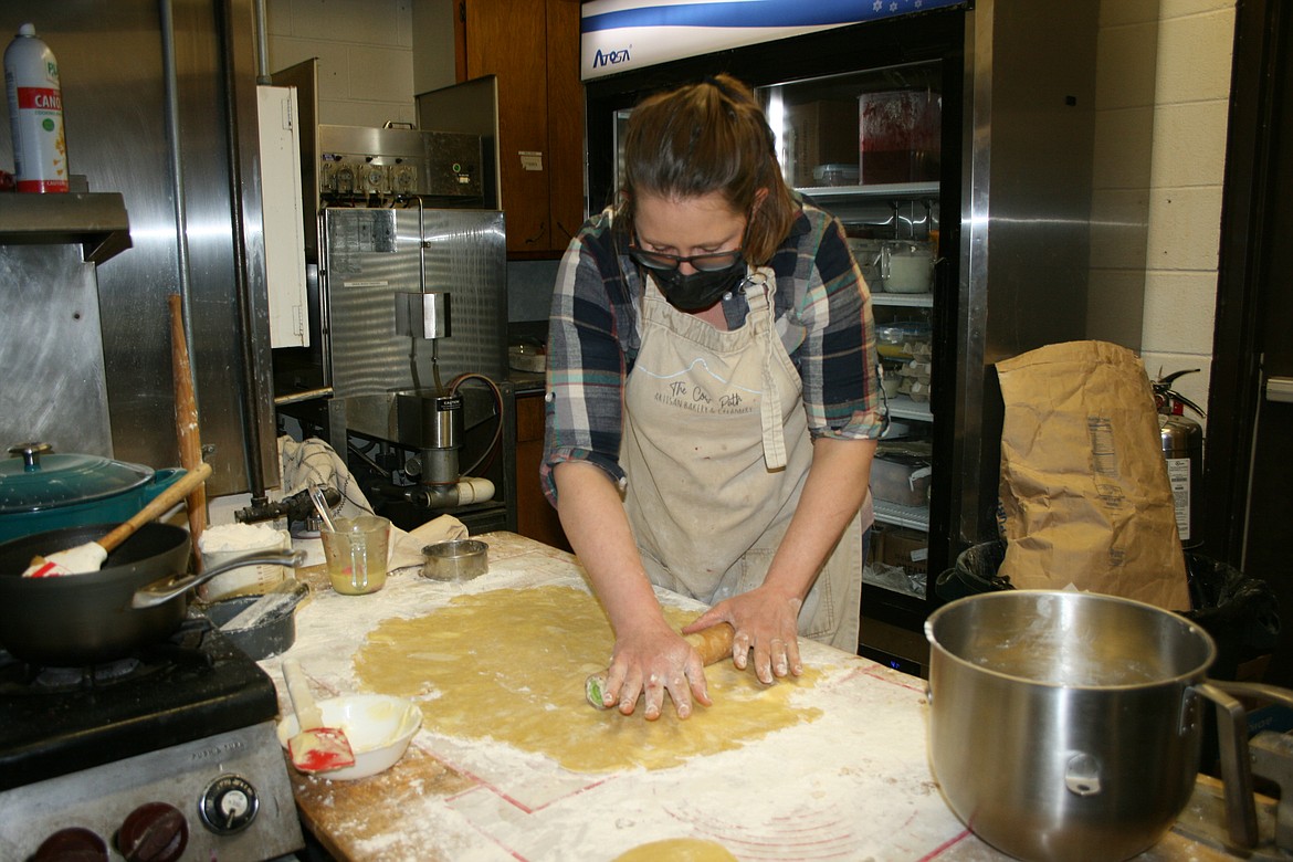 Janice Baginski, owner of the Cow Path: Artisan Bakery and Creamery, rolls out dough.