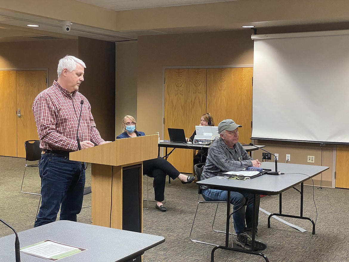 Cory Trapp, right, of Longwell Trap Architects and Kootenai County project manager/consultant Shawn Riley speak to the commissioners about the attorney center and costs. (MADISON HARDY/Press)