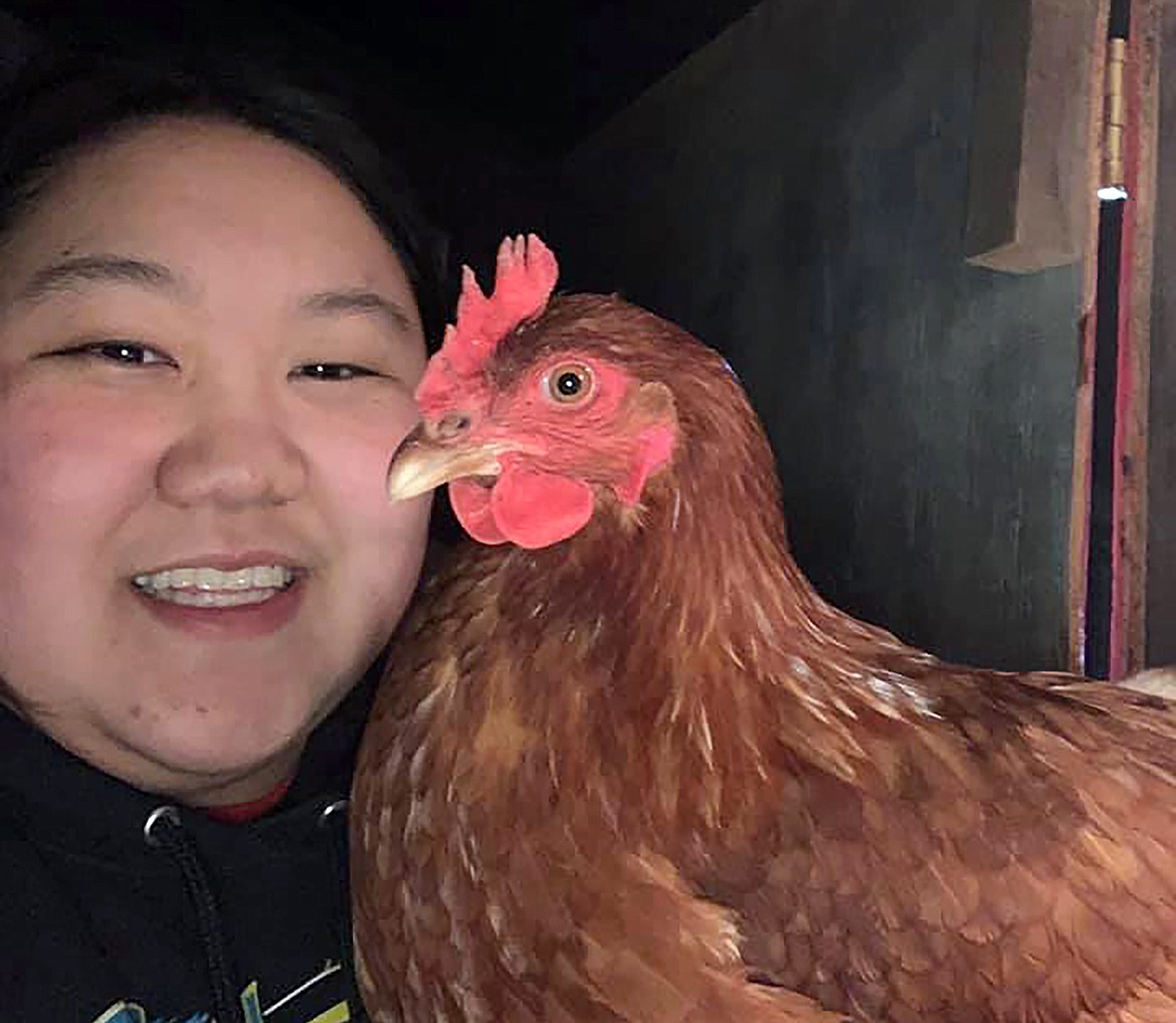 Janna Brown shared this Best Shot of her hanging out with her chicken. If you have a photo that you took that you would like to see run as a Best Shot or I Took The Bee send it in to the Bonner County Daily Bee, P.O. Box 159, Sandpoint, Idaho, 83864; or drop them off at 310 Church St., Sandpoint. You may also email your pictures in to the Bonner County Daily Bee along with your name, caption information, hometown and phone number to bcdailybee@bonnercountydailybee.com.