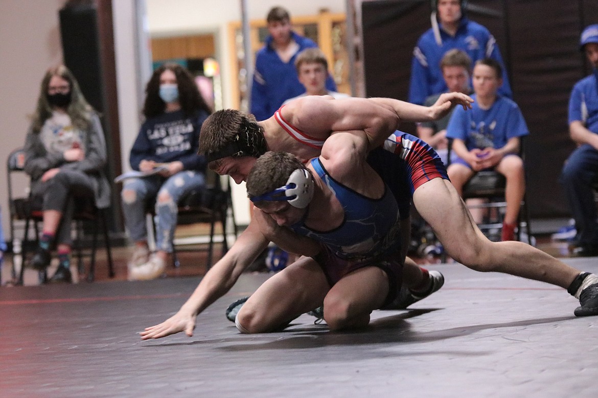 Bigfork's Shelton Woll pinned Mission/Charlo wrestler Charlie Adams in 3:40 Saturday.

Sally Anderson