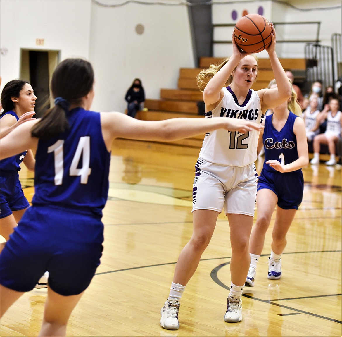 Senior Liev Smith looks for a passing lane against the Clark Fork defense. (Scot Heisel/Lake County Leader)