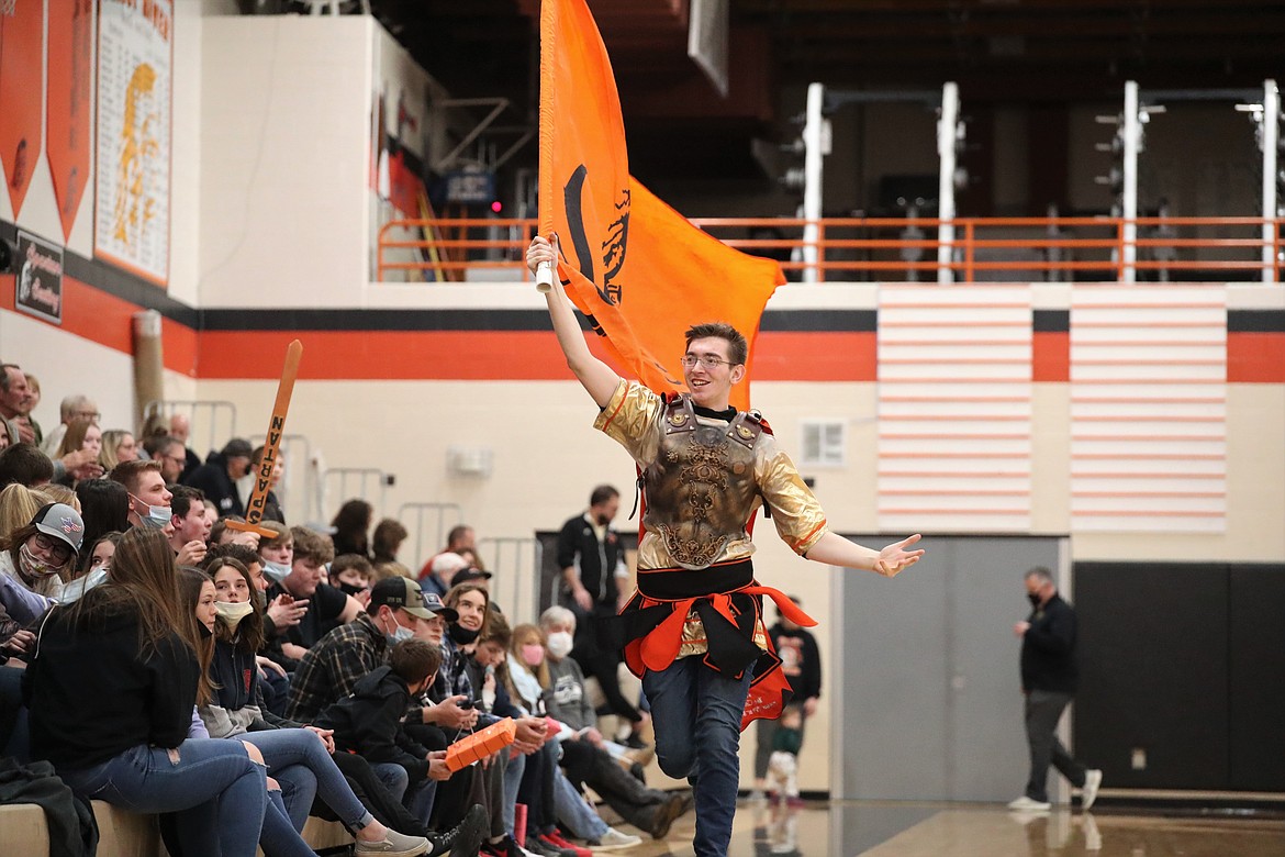 A student dressed in Spartan attire attempts to fire up the crowd on Tuesday.