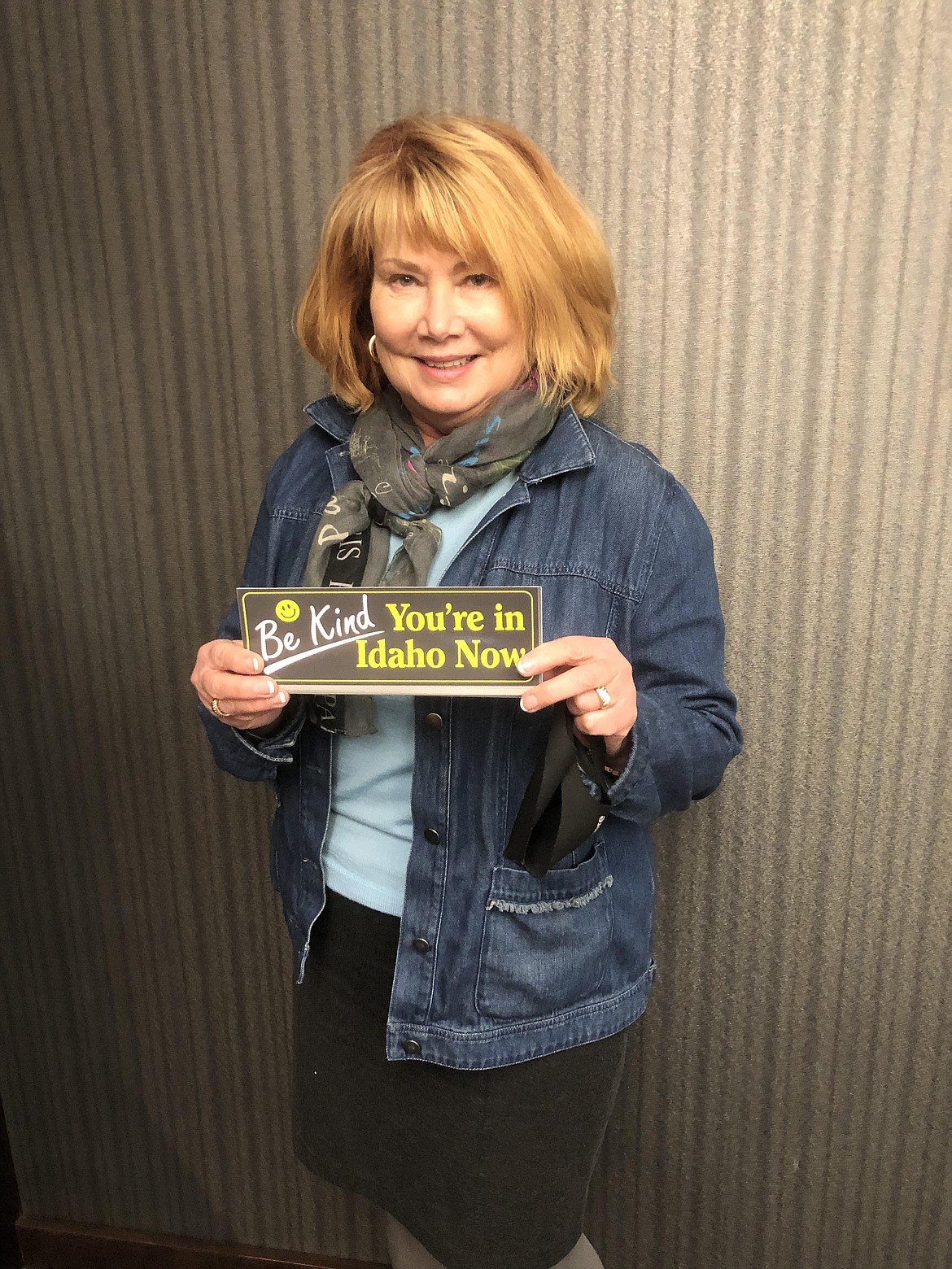 Pat Krug displays the bumper sticker she hopes will encourage drivers to be on their best behavior in Idaho.