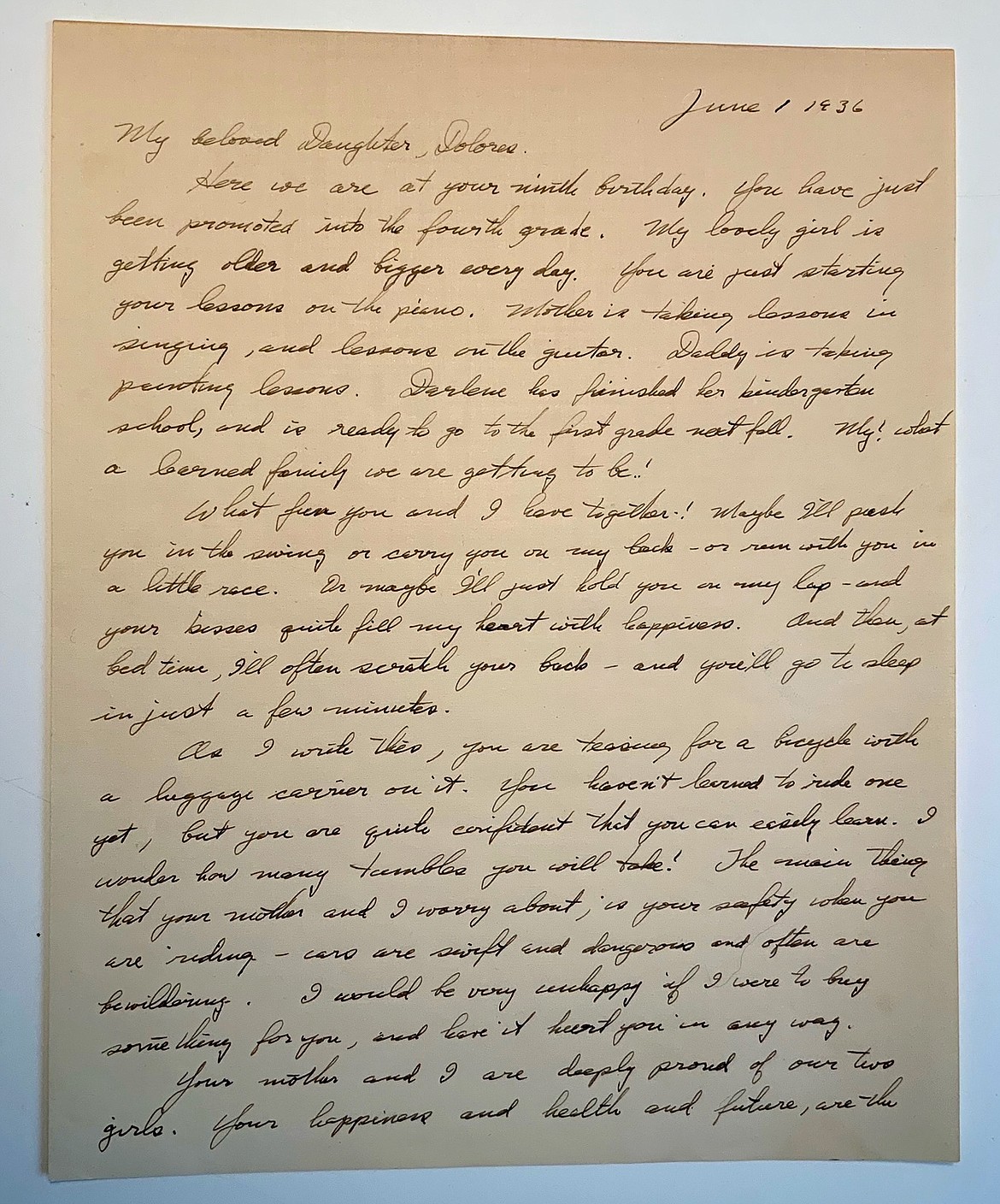 In this 1936 letter, a father shares messages of love for his daughter Dolores to treasure when she grows up. The letter was found sealed in the back of a painting that was in a Coeur d'Alene antique mall 30 years ago. The collector who found it now wants to return the letter and painting to the family.
