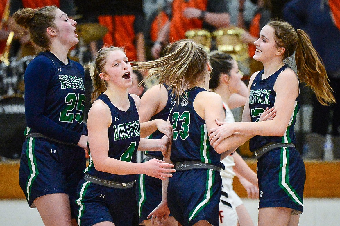 Glacier celebrates after their overtime win over Flathead at Flathead High School on Thursday. (Casey Kreider/Daily Inter Lake)