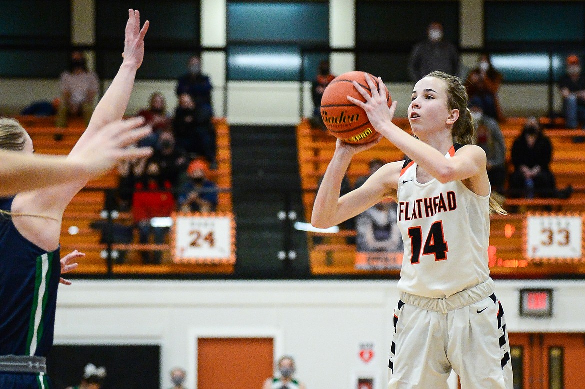 Flathead's Kennedy Moore (14) looks to shoot against Glacier at Flathead High School on Thursday. (Casey Kreider/Daily Inter Lake)