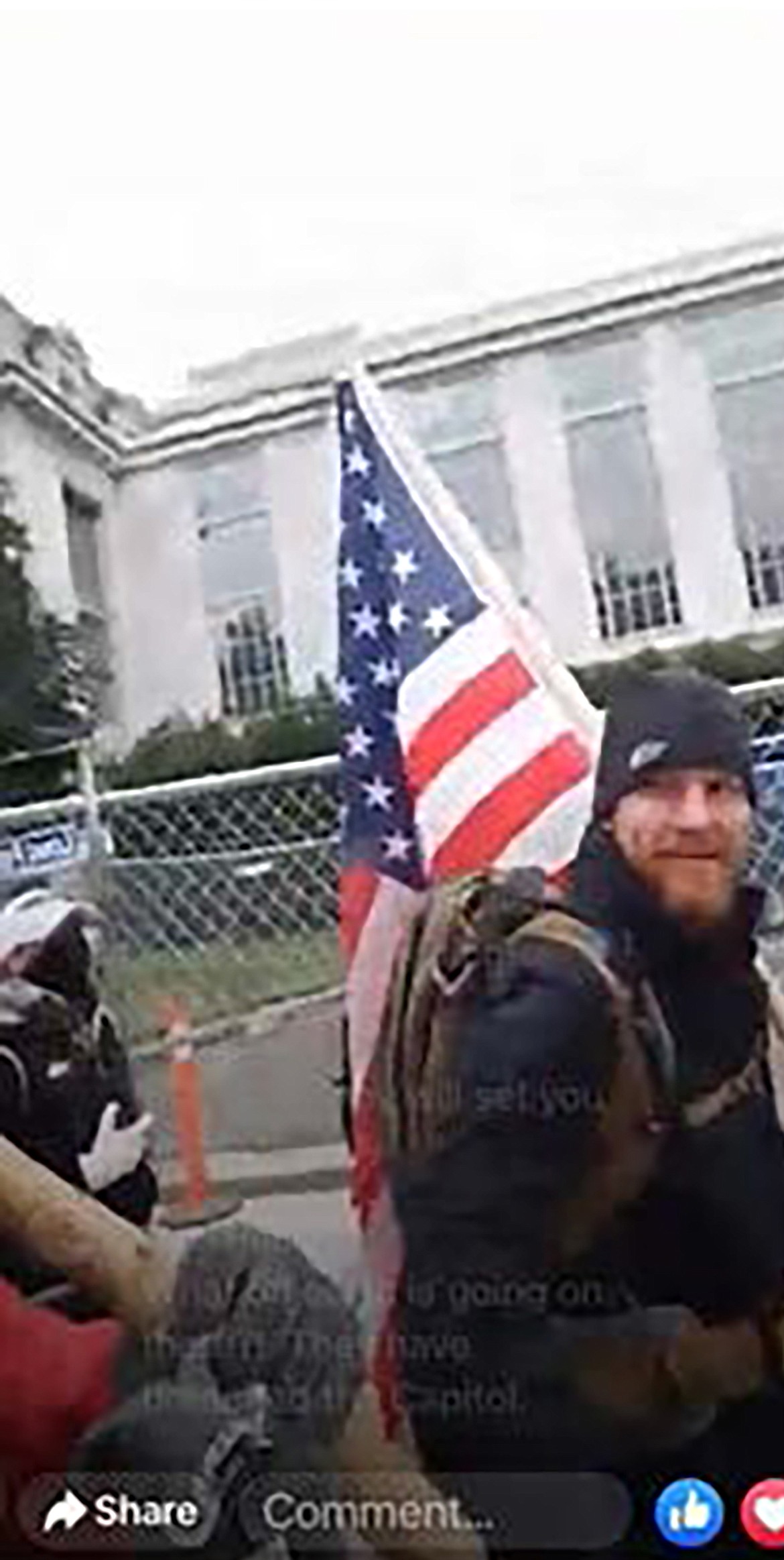 A screenshot appears to show Michael Anthony Pope of Sandpoint at the Jan. 6 march to the Capitol building.