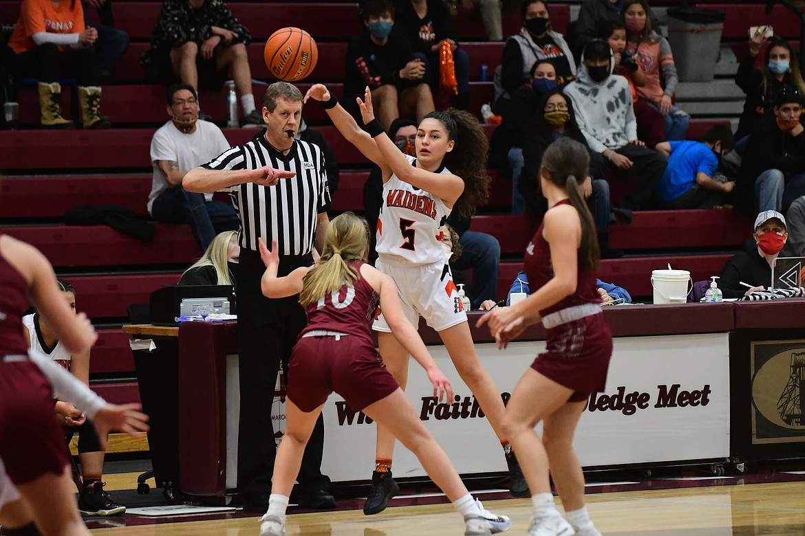 LaReina Cordova (5) fires a pass inside against Hamilton during Friday's semifinal at Butte. (Teresa Byrd/Hungry Horse News)