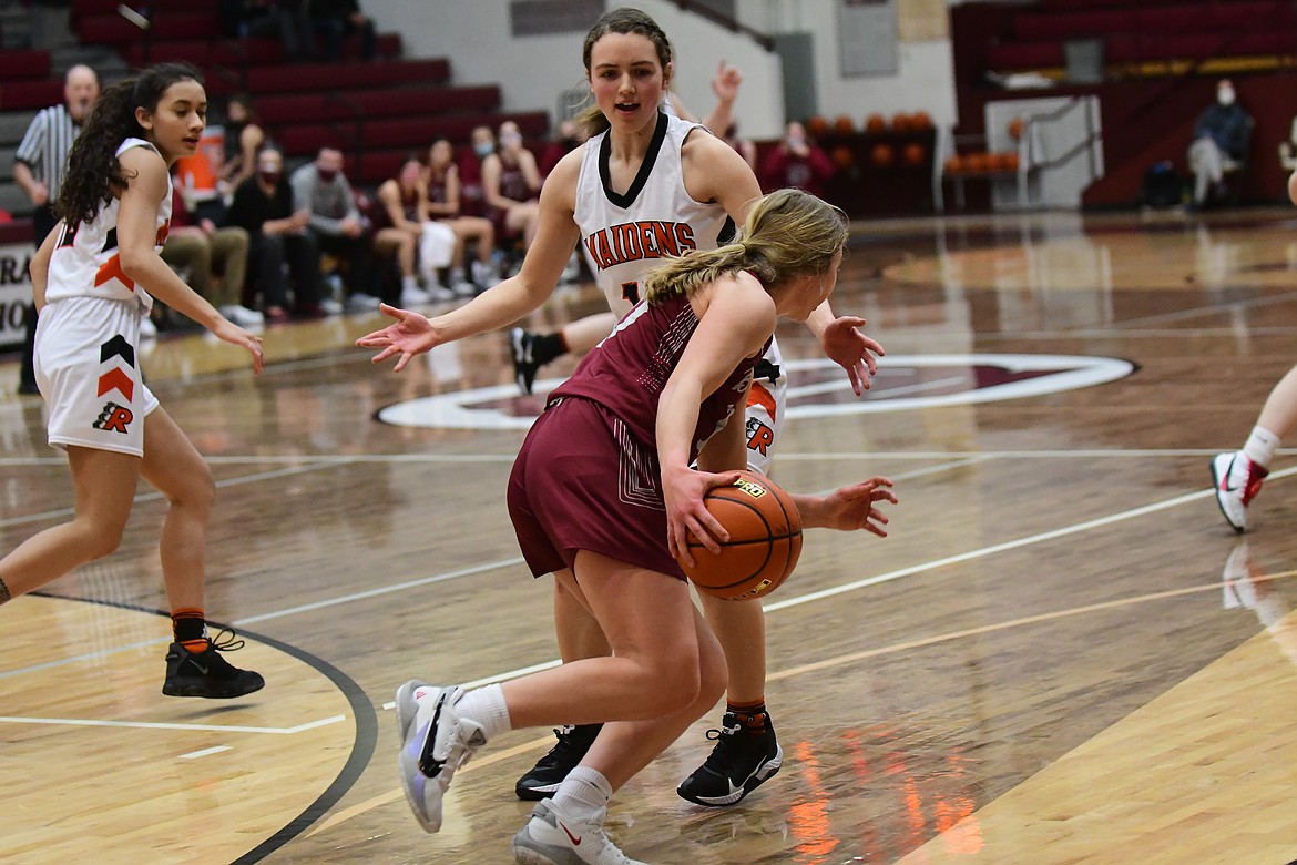 Ronan's Olivia Heiner pressures a Hamilton player during a semifinal game Friday at Butte. (Teresa Byrd/Hungry Horse News)