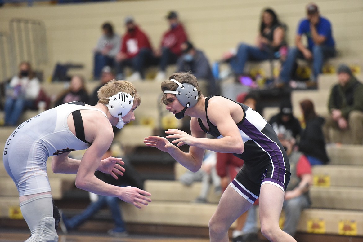 Polson’s Maysn Cowell tangles with Frenchtown’s Nicholai Blanchard at 126 pounds Friday at Libby. (Will Langhorne/The Western News)