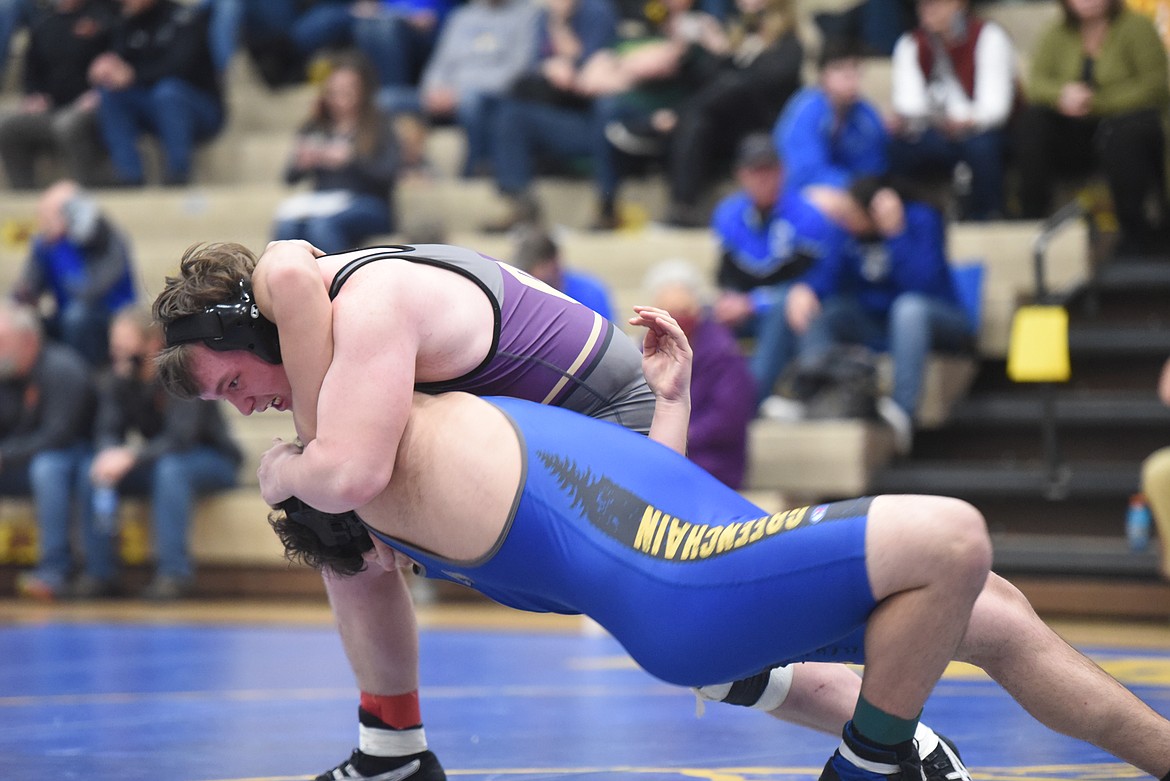 Polson’s Aaron O’Roake takes on Greenchain’s Tyler Smith at 285 pounds Friday at Libby. (Will Langhorne/The Western News)