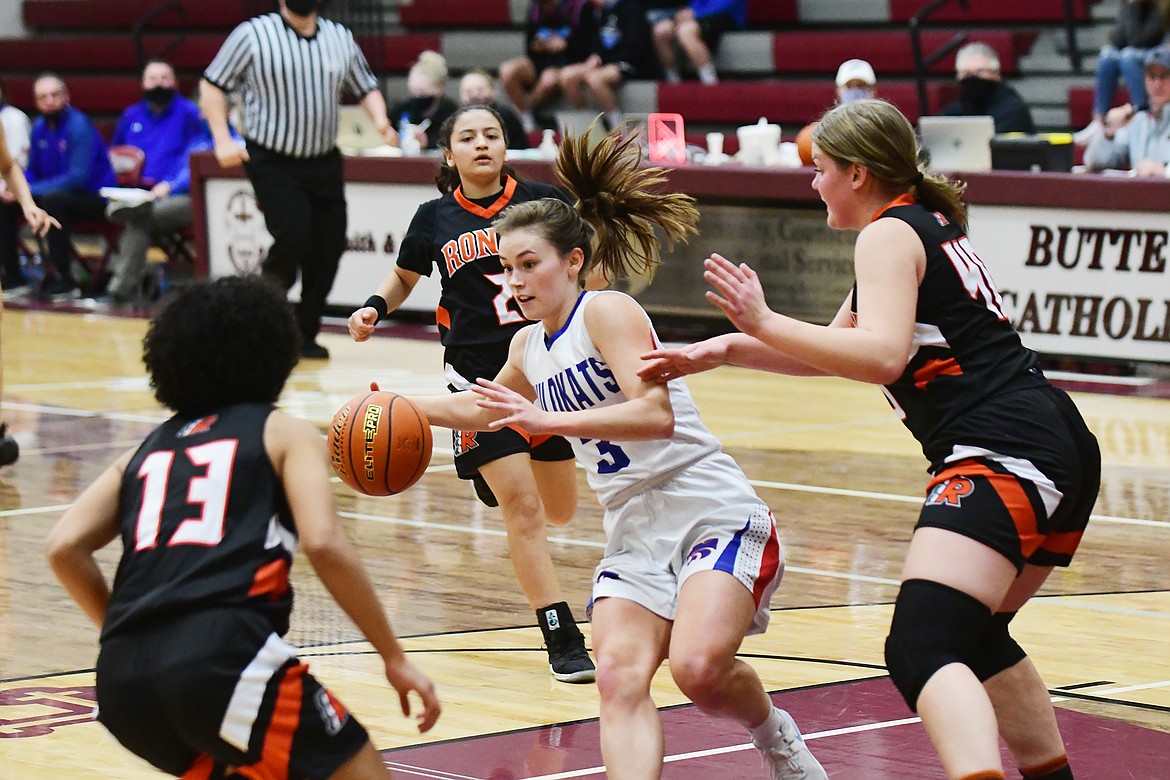Maddie Robison of Columbia Falls looks to split the Ronan defense Saturday during the Western A divisional championship game in Butte on Saturday. (Teresa Byrd/Hungry Horse News)